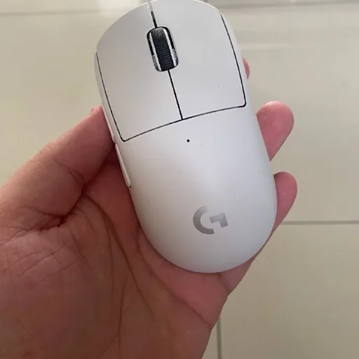 Logitech Superlight 2c gaming mouse, DualSense 5 controller, SIM card router
