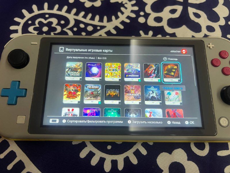 Nintendo Switch lite с играми и чехлом 6