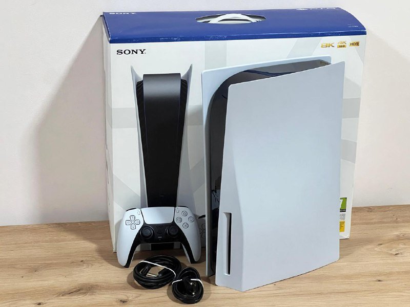 Sony PlayStation 5 CFI-1216A with controller and games