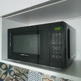 Кактусы, комод, микроволновка 7