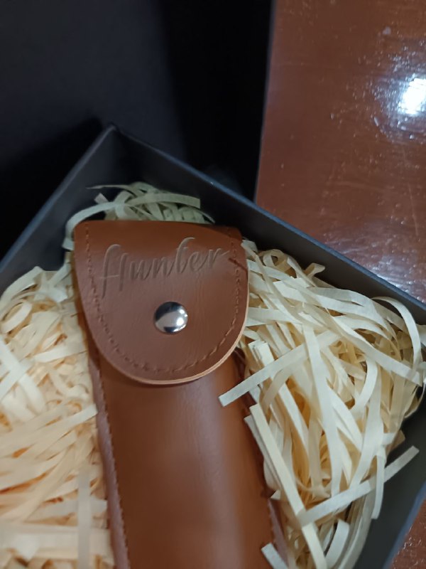 Corkscrew with leather case