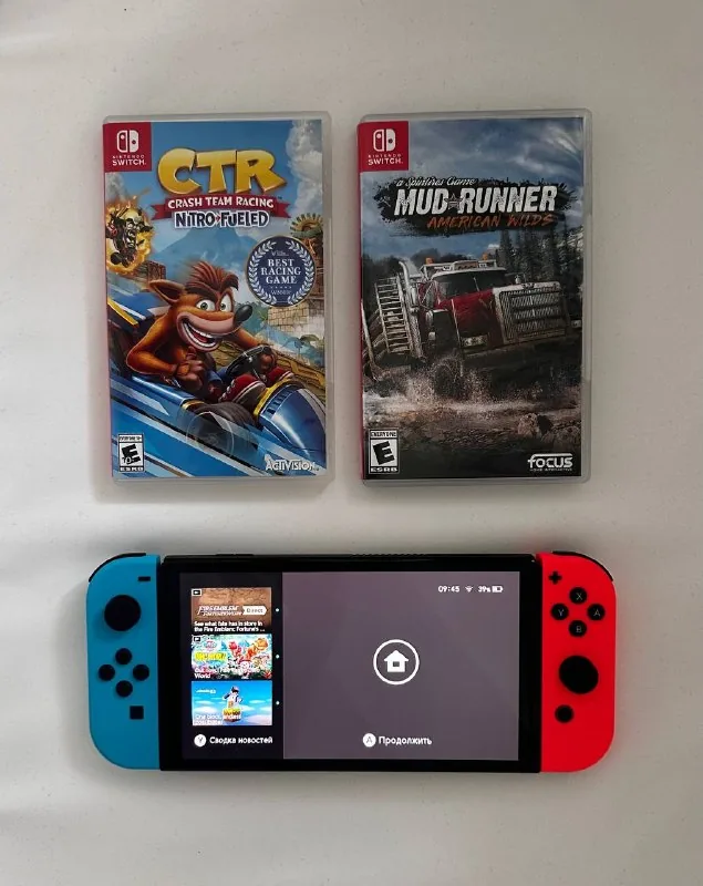 Nintendo Switch OLED, две игры