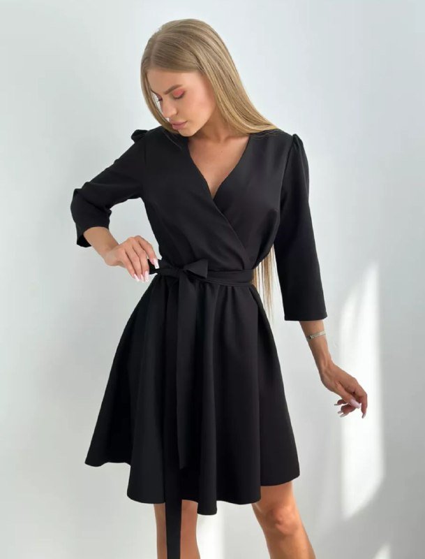 Женское платье с удлиненным рукавом