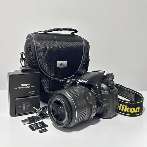 Зеркальный фотоаппарат Nikon D3100 с объективом 18-55mm VR