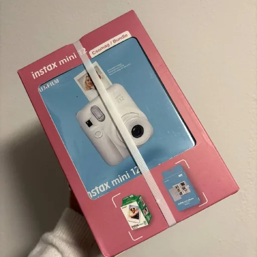 Новая камера Fujifilm Instax Mini 12 с картриджами и альбомом
