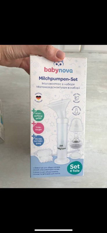 Молокоотсос механический с бутылочкой для младенцев 1