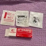 MacBook Pro, матрас, стол, термосы, карандаши, бумага, дождевик, форма 10