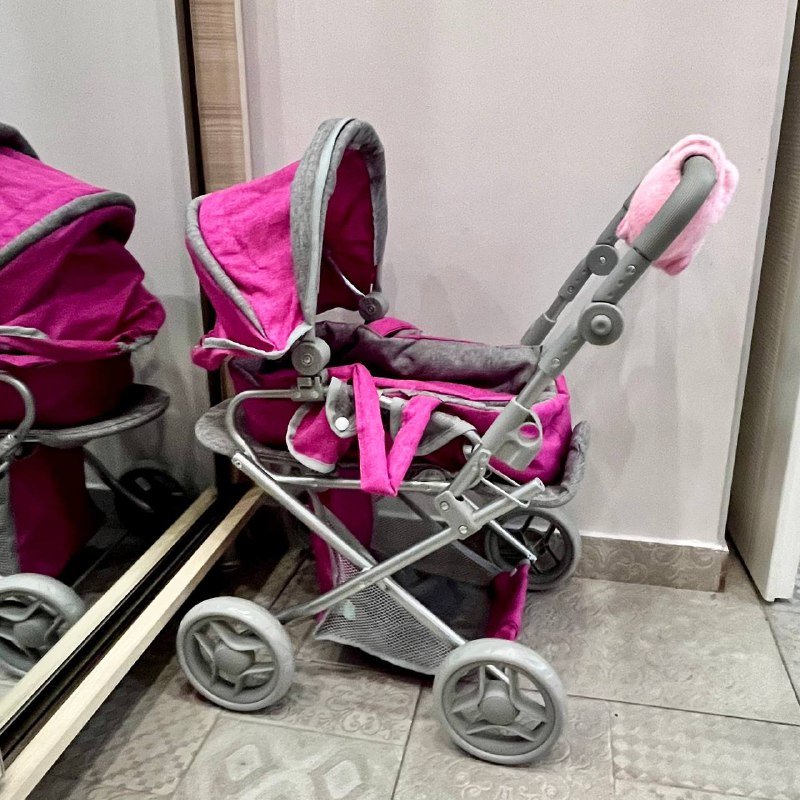 Игрушечная коляска