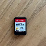 Диски Ghost of Tsushima, Death Stranding, Nioh 2, картридж Super Smash Bros Ultimate 2