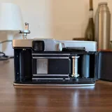 плёночный фотоаппарат Olympus Pen F, объектив Olympus Zuiko 38mm 4
