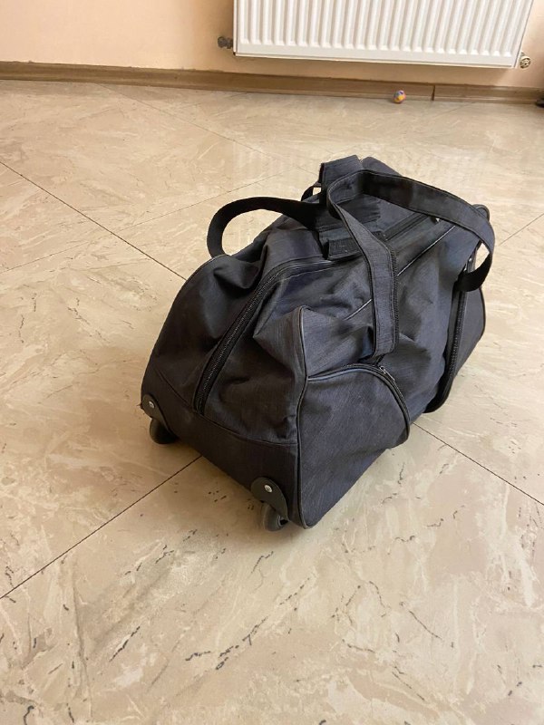 Дорожная сумка с ручкой и колесиками 10