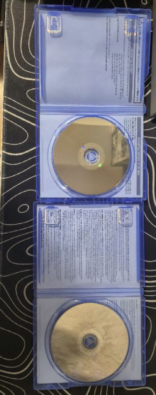 PlayStation 4 with FIFA 21 and Jurassic World Evolution 2 9