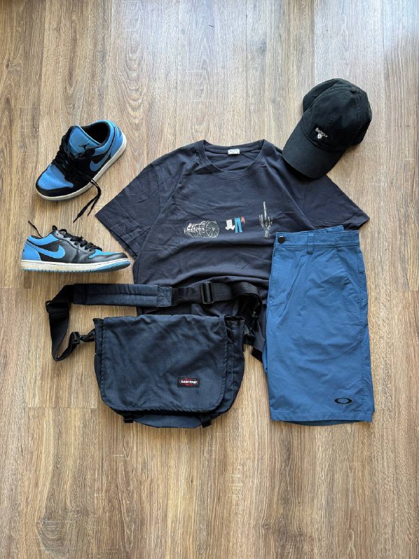 Футболка Paul Smith, шорты Oakley, мессенджер Eastpack, кепка Barbour, кроссовки Nike Air Jordan 1