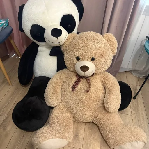 Large plush panda and teddy bear