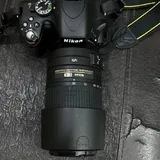 Nikon D5100 с объективом Nikon 55–300mm VR 2
