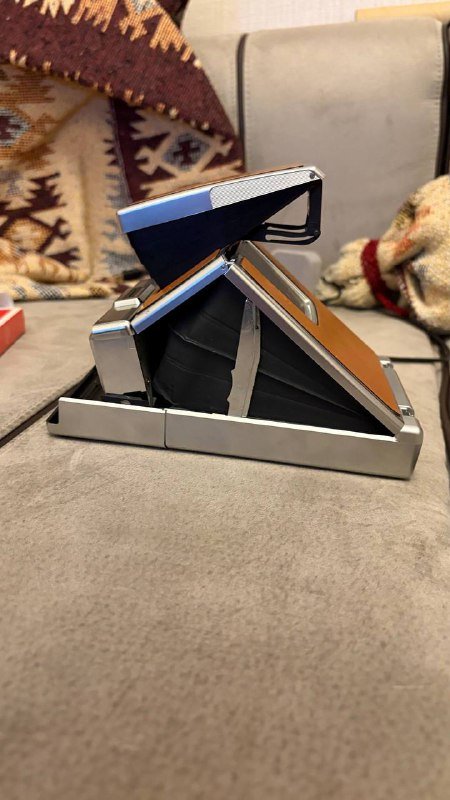 Polaroid SX-70 Alpha 1, Mint Flash Bar 2, Polaroid SX-70 Film 4