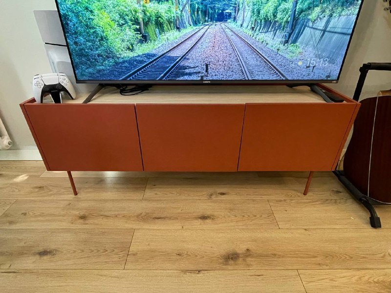 Тумбочка под телевизор терракотового цвета