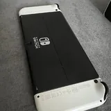 Nintendo Switch OLED с джойконами, чехлом, игрой 3