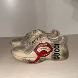Gucci track jacket, Heron Preston hoodie, CP Company hoodie, Etudes T-shirt, Gucci sneakers, Adidas sneakers, Premiata sneakers 5