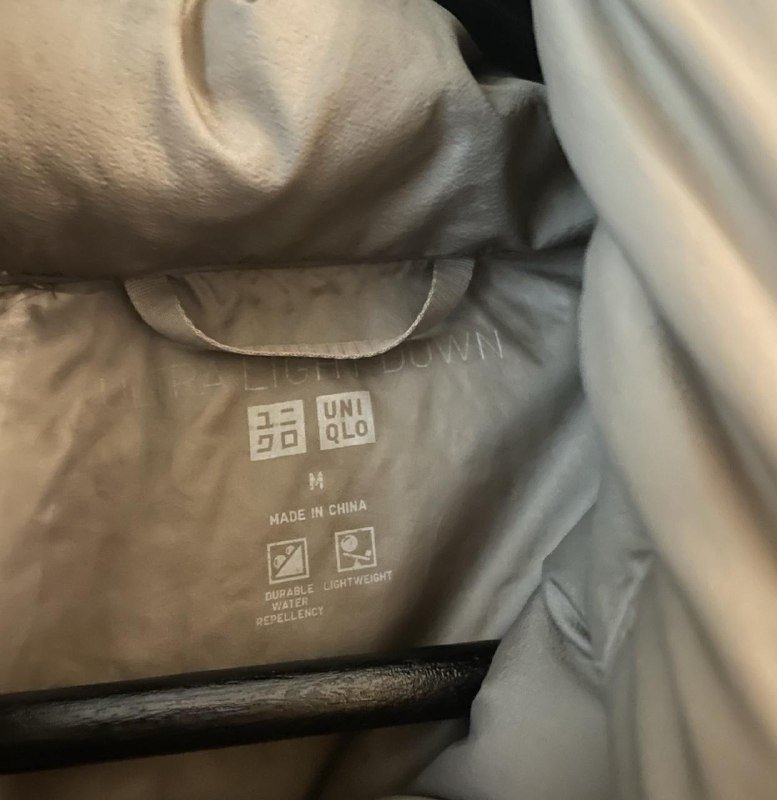 Женский пуховик Uniqlo оливкового цвета 4