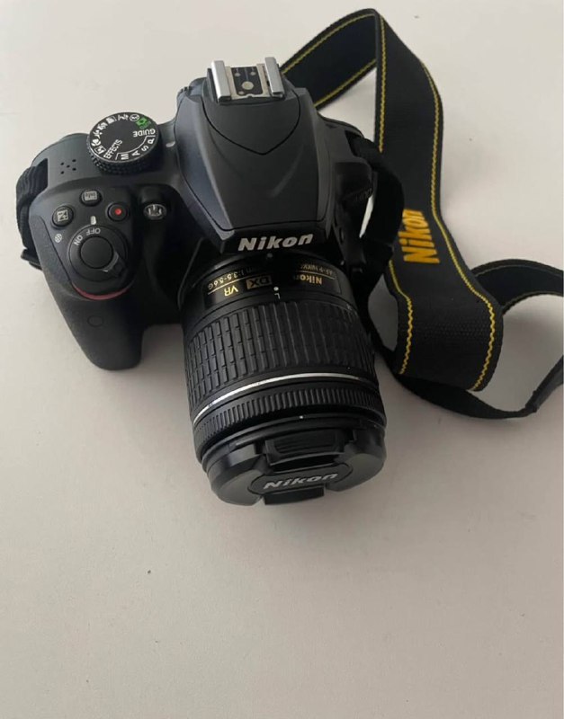 Nikon DSLR camera with memory card and case