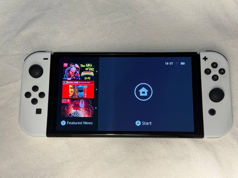 Nintendo Switch OLED, игры, сумка для переноски 2
