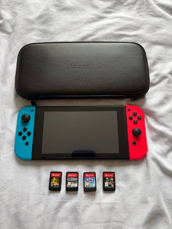 Nintendo Switch с играми, зарядным и чехлом