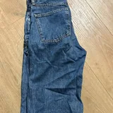 Джинсы и черные штаны XS 6