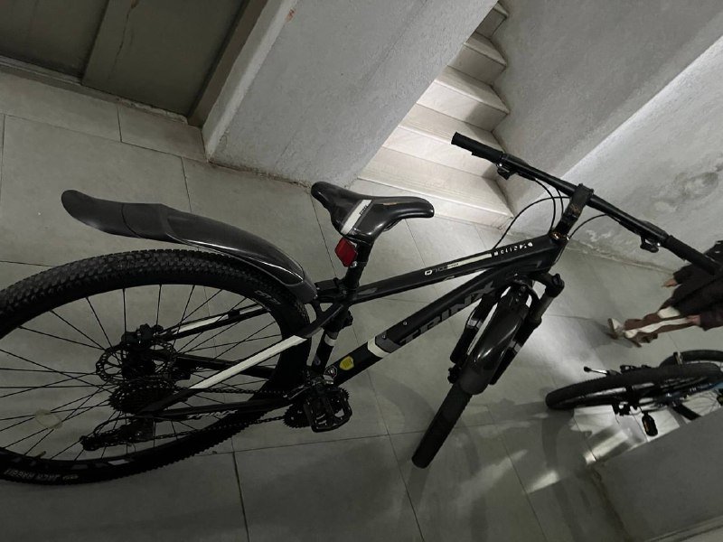 Черный горный велосипед Trinx