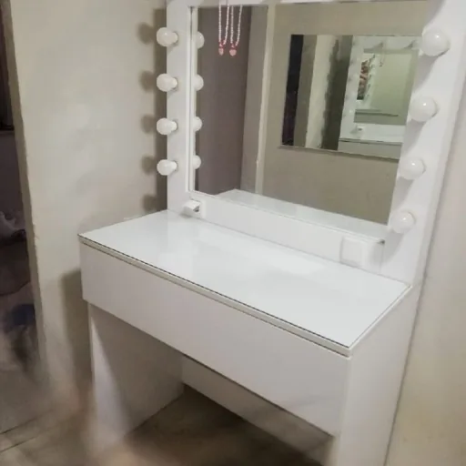 White vanity table with mirror