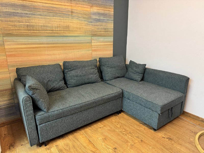 Угловой раскладной диван с местом для хранения
