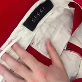 Louis Vuitton Avenue Sling, цепочка, браслет, кеды, брюки, сумка 7