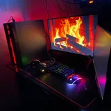 Игровой компьютер с двумя мониторами, клавиатурой, мышью и гарнитурой 1