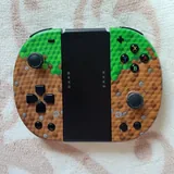 Nintendo Switch OLED с двумя парами контроллеров и чехлами 6