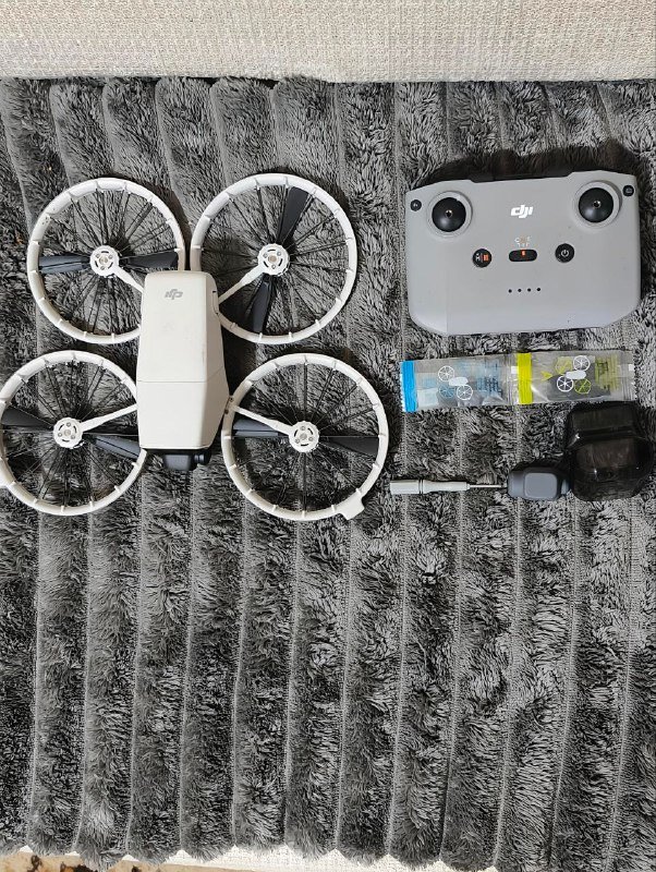 Комплект DJI Flip с пультом и комплектом запасных лопастей 1