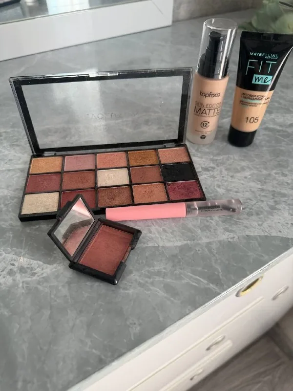 Eyeshadow palette, foundations and lipstick