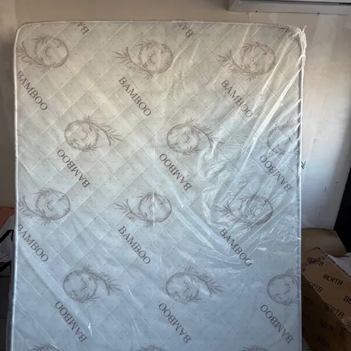 Новый матрас в упаковке