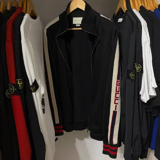 Gucci track jacket, Heron Preston hoodie, CP Company hoodie, Etudes T-shirt, Gucci sneakers, Adidas sneakers, Premiata sneakers