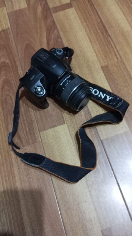 2 фотоаппарата, держатель