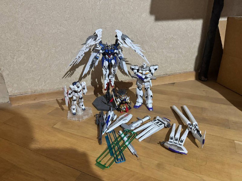 Gundam models lot with stickers and boxes