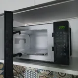 Кактусы, комод, микроволновка 6