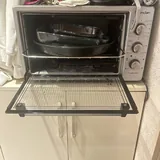 Мотоциклетный шлем, духовка с посудой, подставка для ноутбука 2
