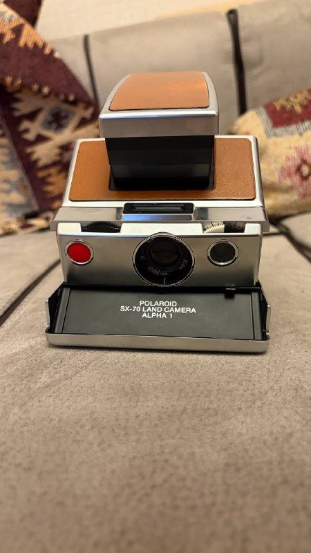 Polaroid SX-70 Alpha 1, Mint Flash Bar 2, Polaroid SX-70 Film 3