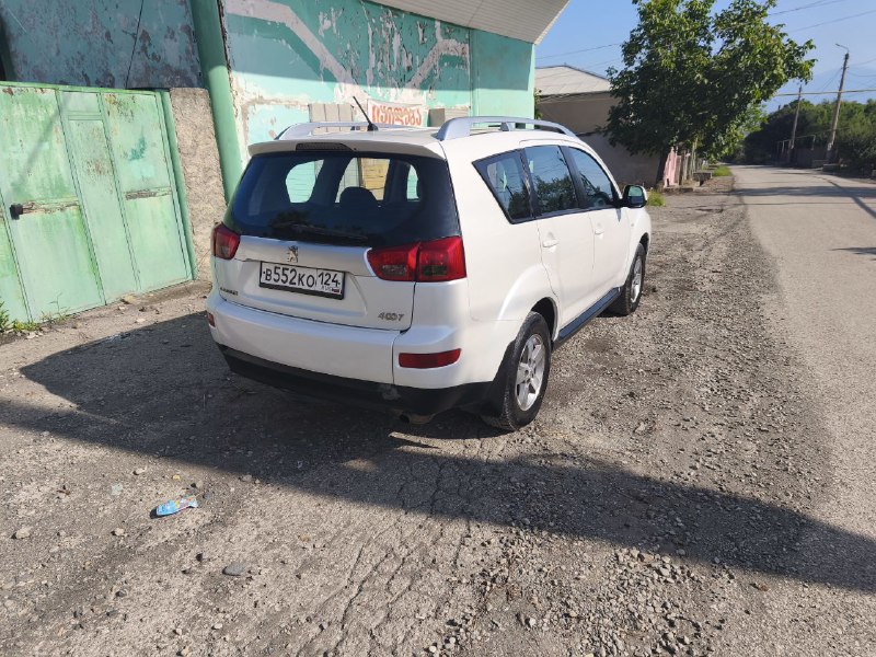 Peugeot 4007 2012 года 3