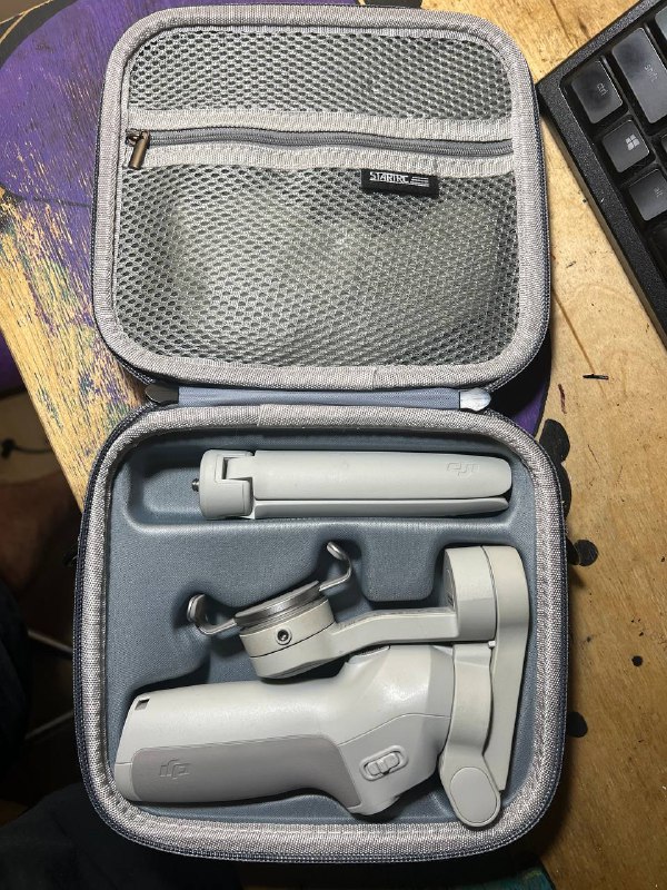 Стабилизатор для смартфонов DJI Osmo SE с кейсом