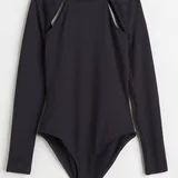H&M bodysuit, pajama set, Nike hoodie, bodysuit, suit, Zara windbreaker, Puma puffer jacket, Zara blazer, Stradivarius jeans 1