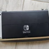 Nintendo Switch OLED, игра Pokémon Let's Go Eevee 2