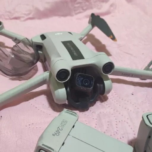 DJI Mini 3 Pro with accessories and controllers