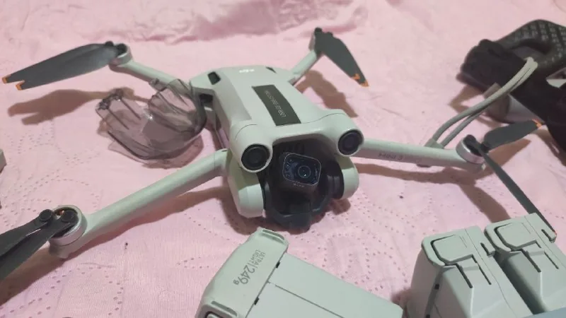 DJI Mini 3 Pro with accessories and controllers 1