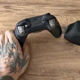 Xbox Series X с тремя геймпадами 3